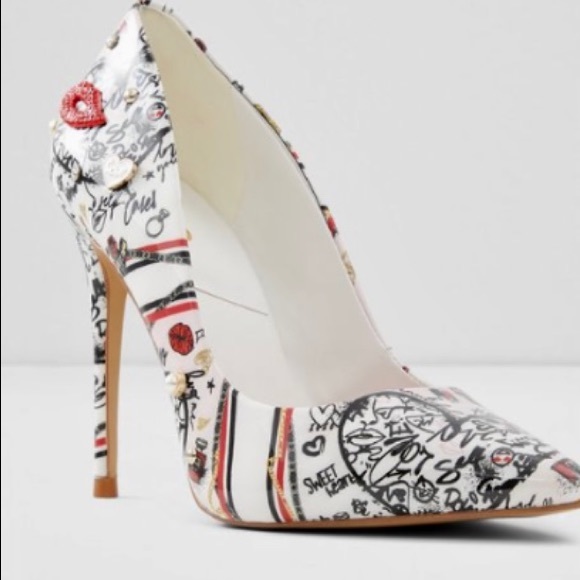 Brand new in box! Aldo pumps. Gorgeous girly details, sparkles, lips. Etc